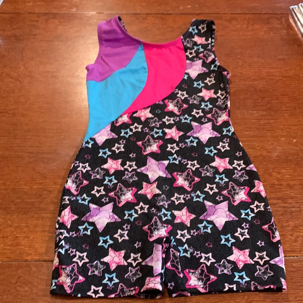 Leotard - pink/black/teal/purple with stars.  Size M.